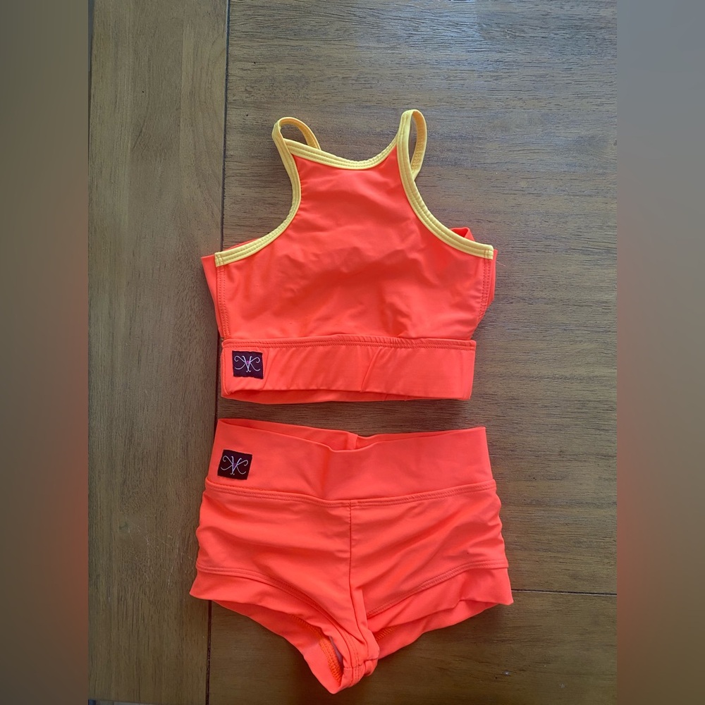 Kandi Kouture bright orange Leo. Child medium 5/6